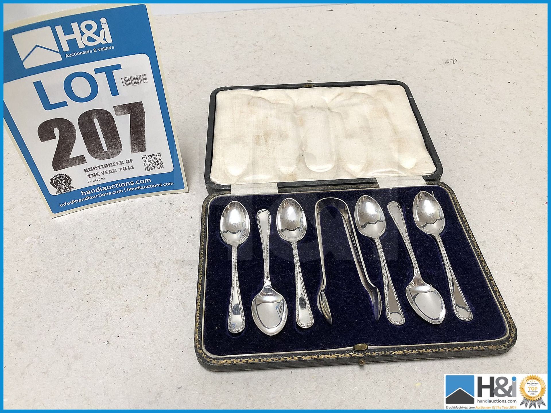 Set of silver plate spoons in case.