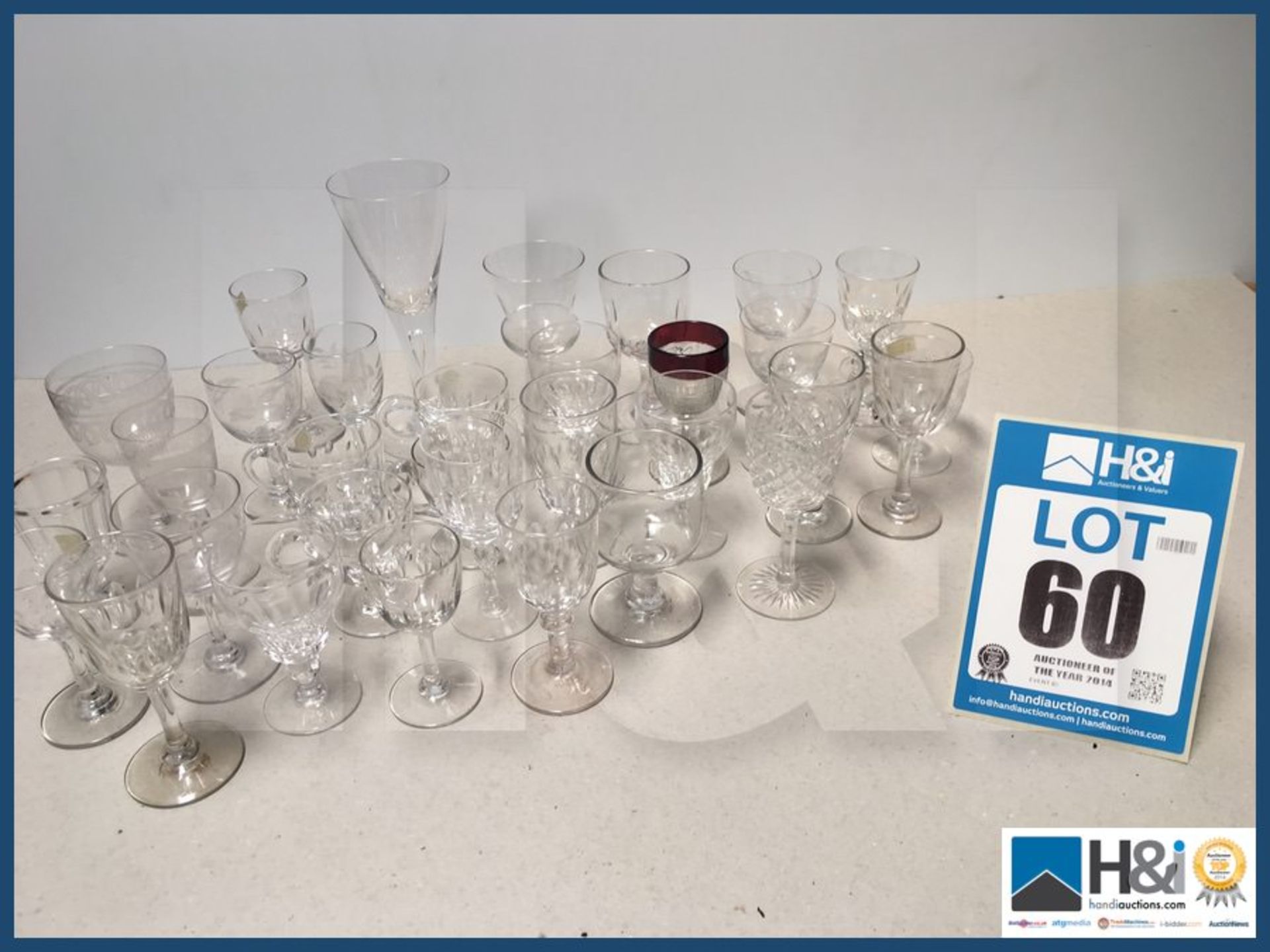 Collection of small vintage wine and sherry glasses.