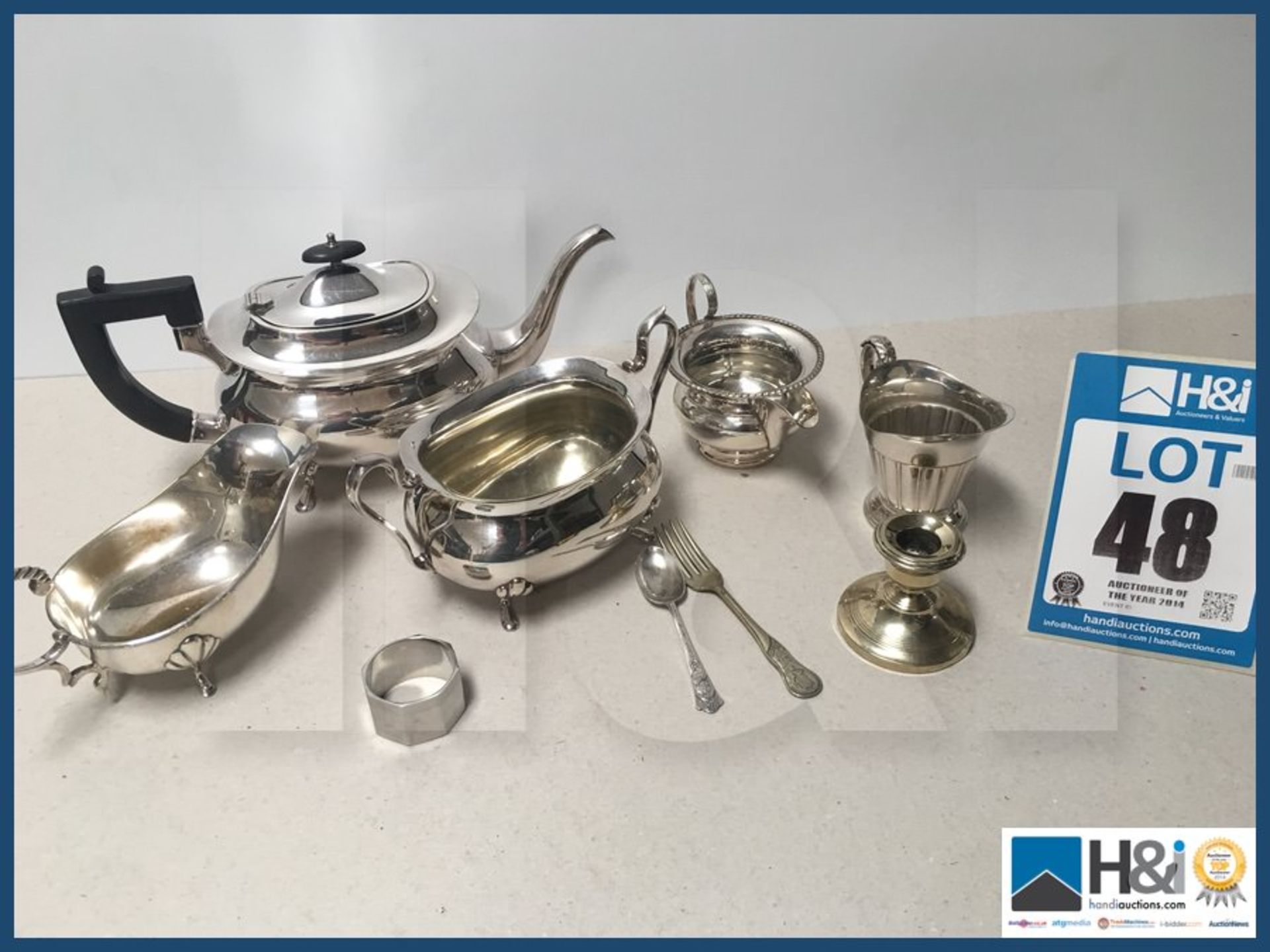 Various vintage metalware teapots etc..