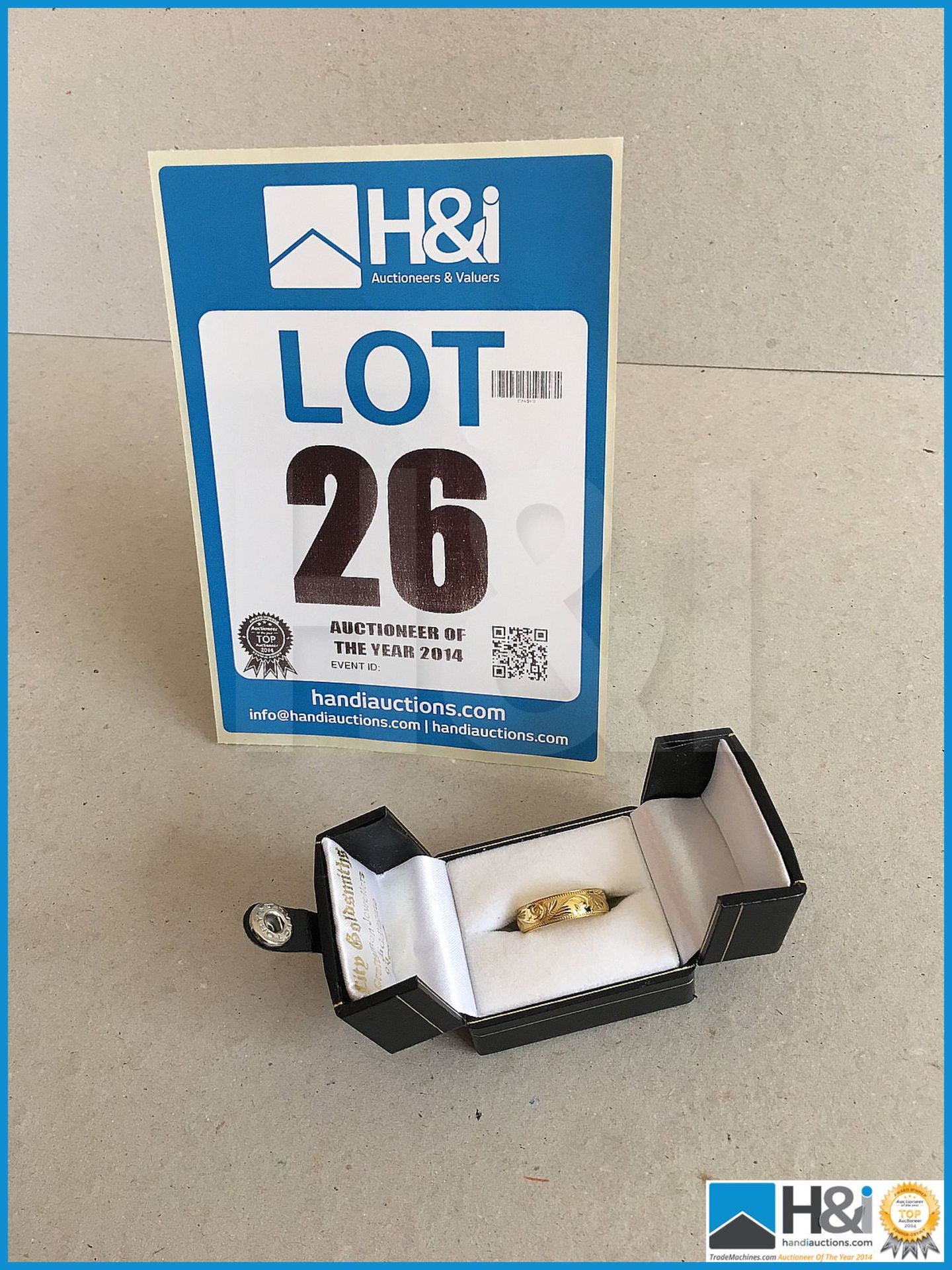 18 Carat Gold wedding ring in box.