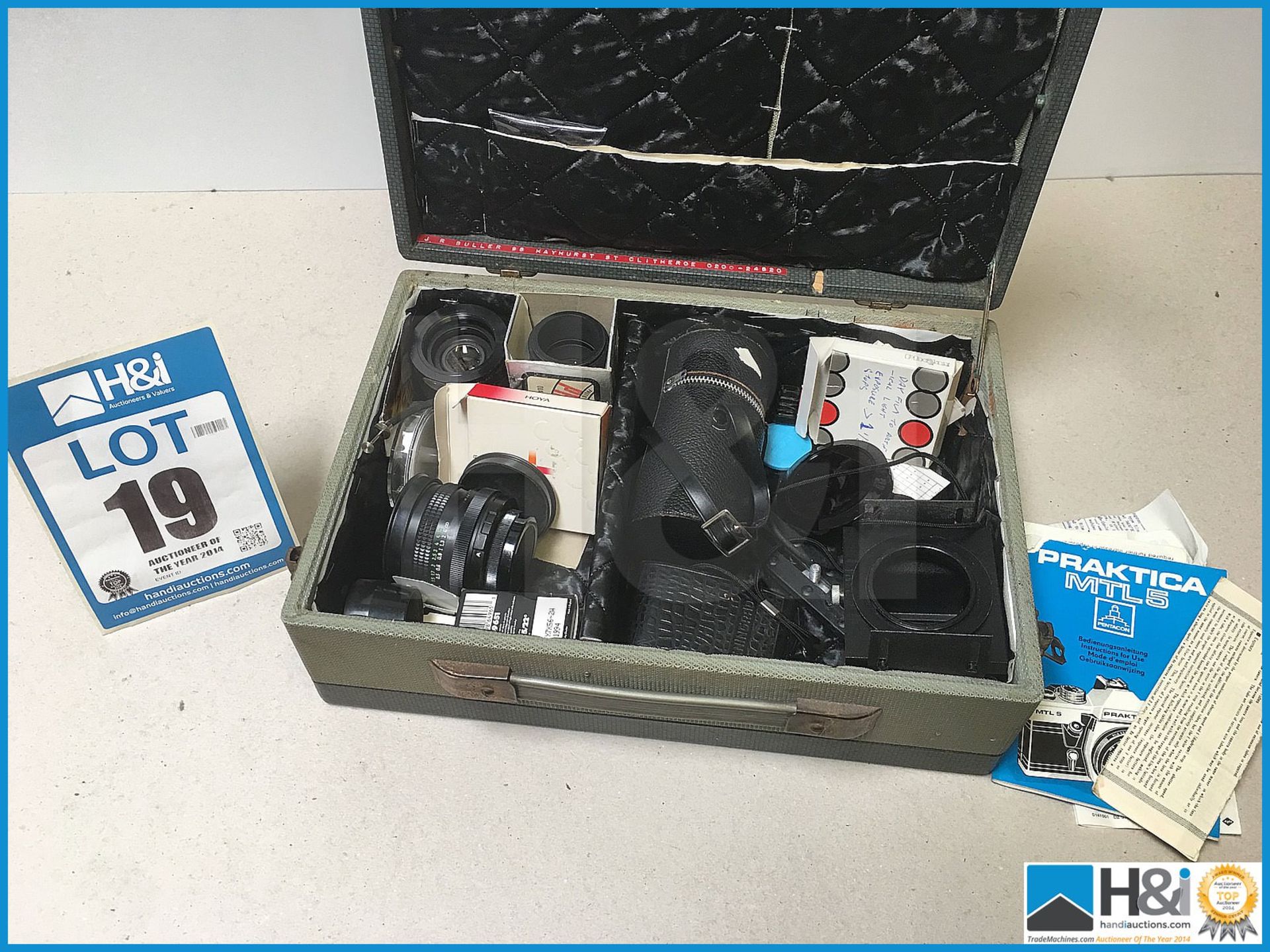 Box of various photography equipment.