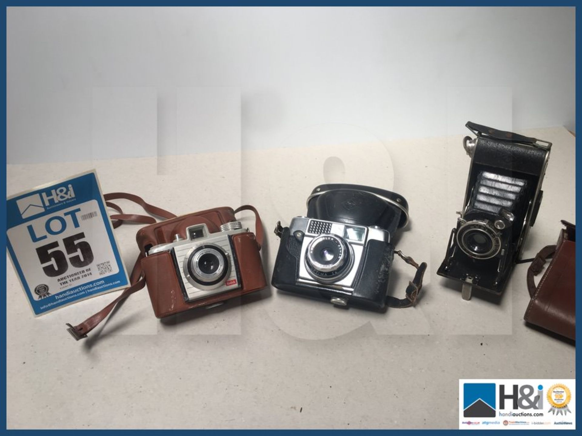 Three vintage camera's.