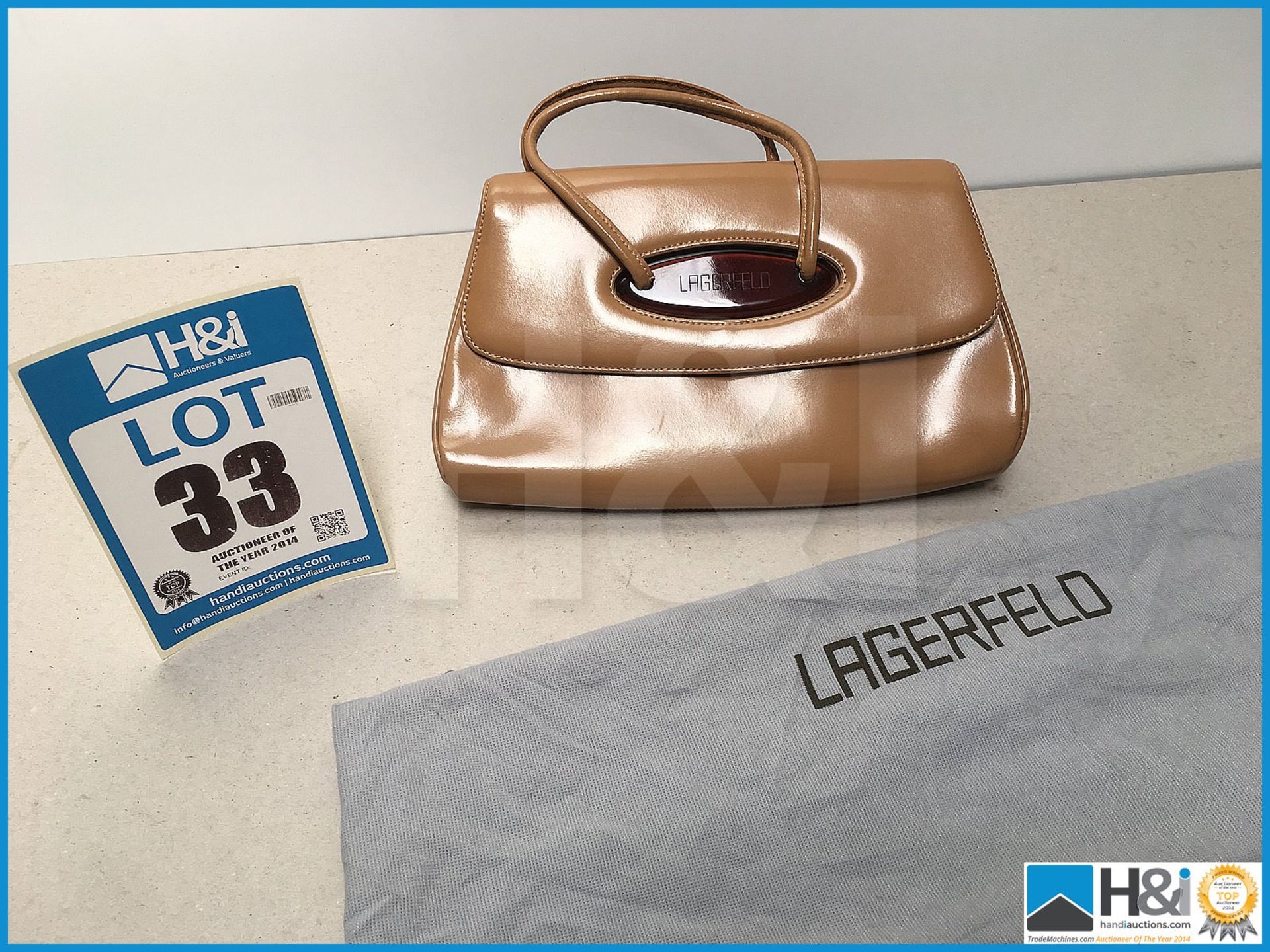 Genuine Karl Largerfeld handbag with original tie bag in excellent condition.