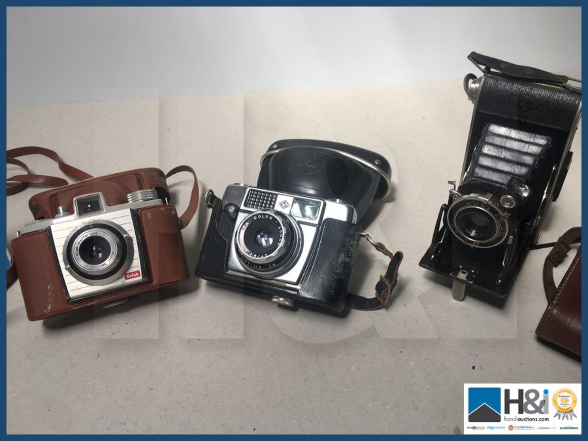 Three vintage camera's. - Image 2 of 2