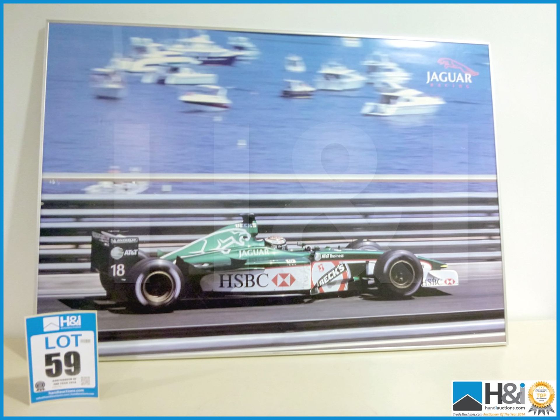 Large aluminium framed print of Jaguar F1 car, Eddy Irvine at Monaco. Appx 39in x 27in -- MC:N/A CIL