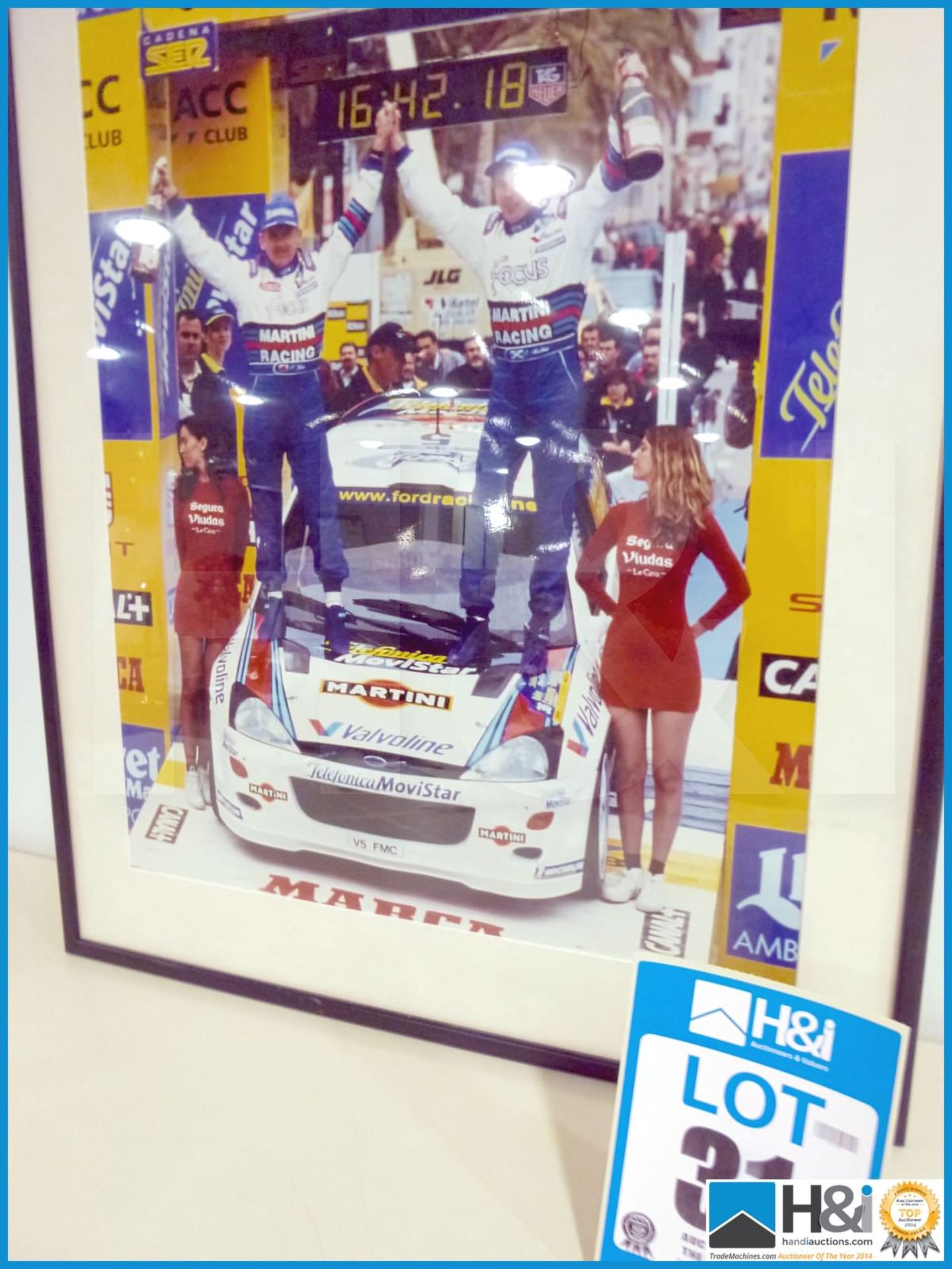 Framed print of Colin McRae and Nicky Grist Catalunya podium win. Appx 21in X 29in -- MC:N/A CILN:N/ - Image 3 of 3