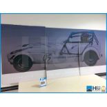 Large format, 3 part print of Cosworth Caterham car. Capton reads 'Reliability. Innovation. Performa