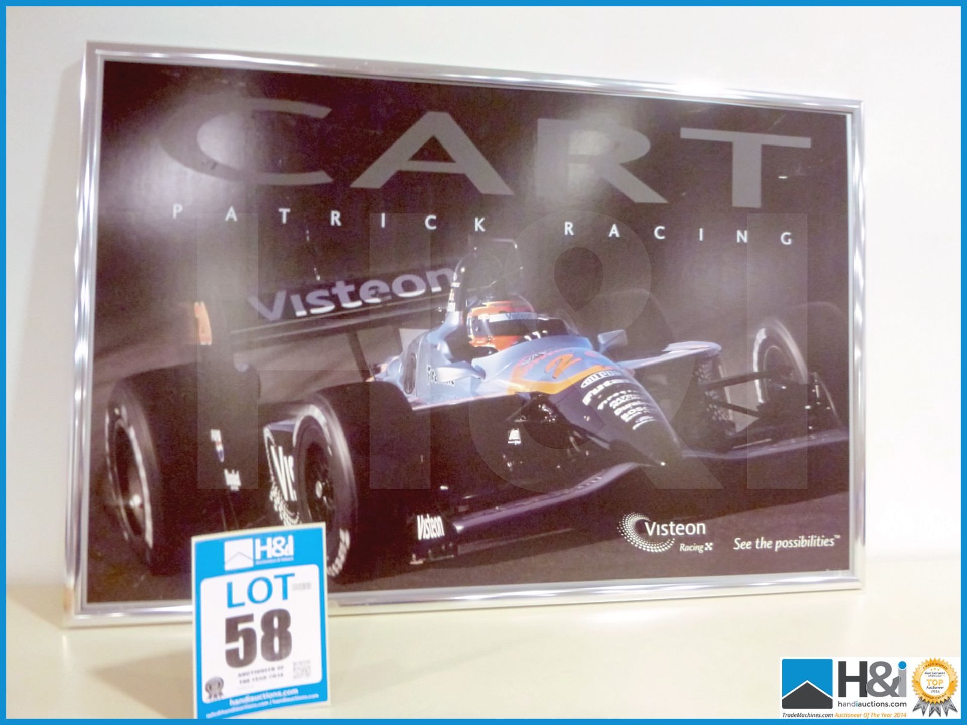 Large metal framed print of an Indy Car, captions read 'Cart Patrick Racing - Visteon'. Slight marki