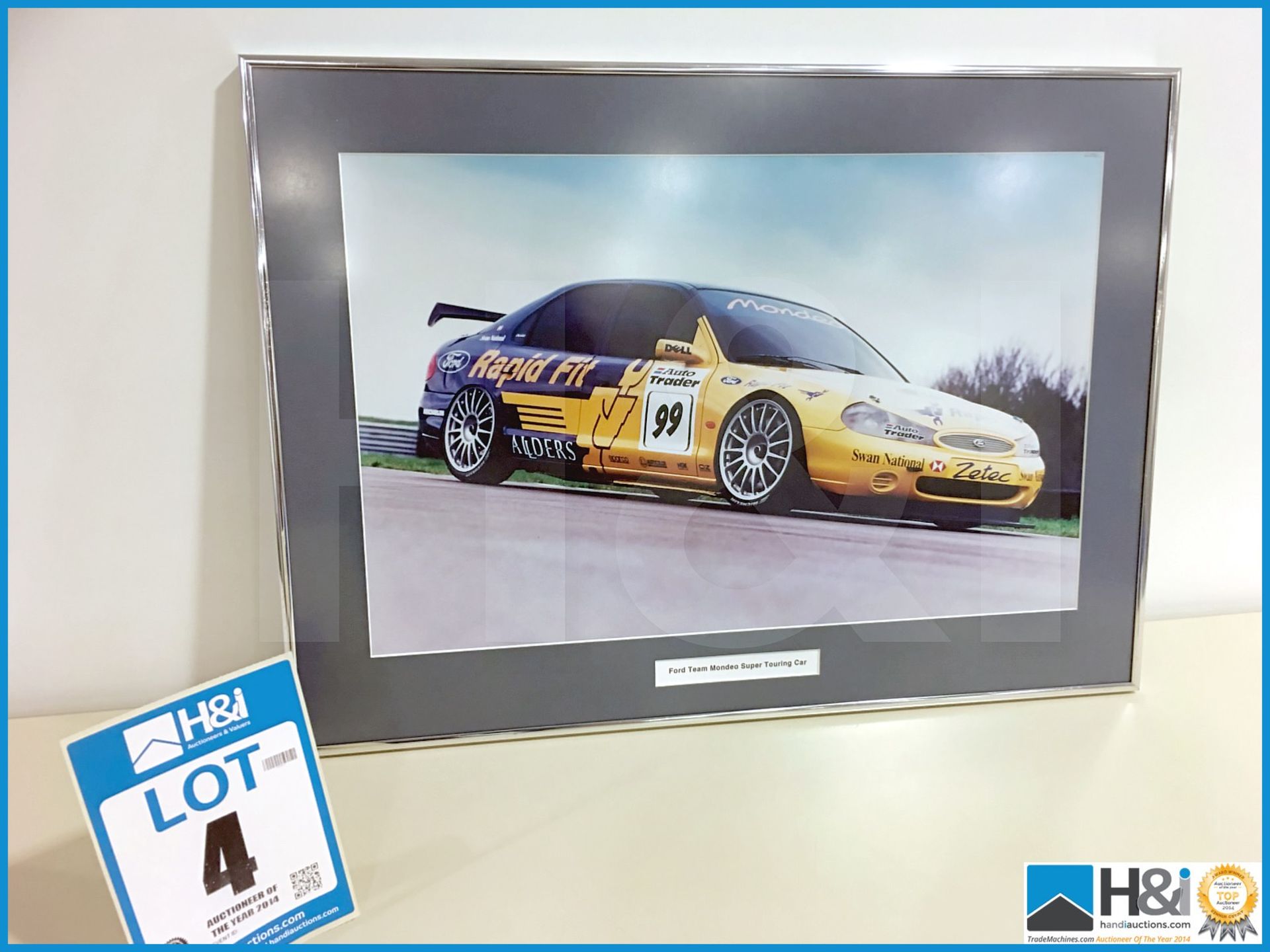 Framed Ford Team Mondeo Super Touring Car. Appx 24in X 17in. From the Cosworth Archives -- MC:N/A CI