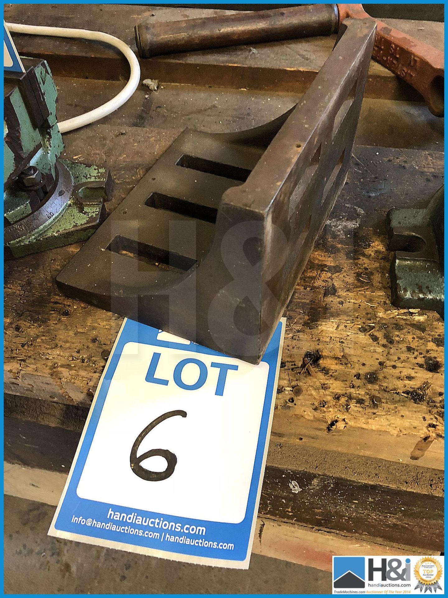 Angled machine plate