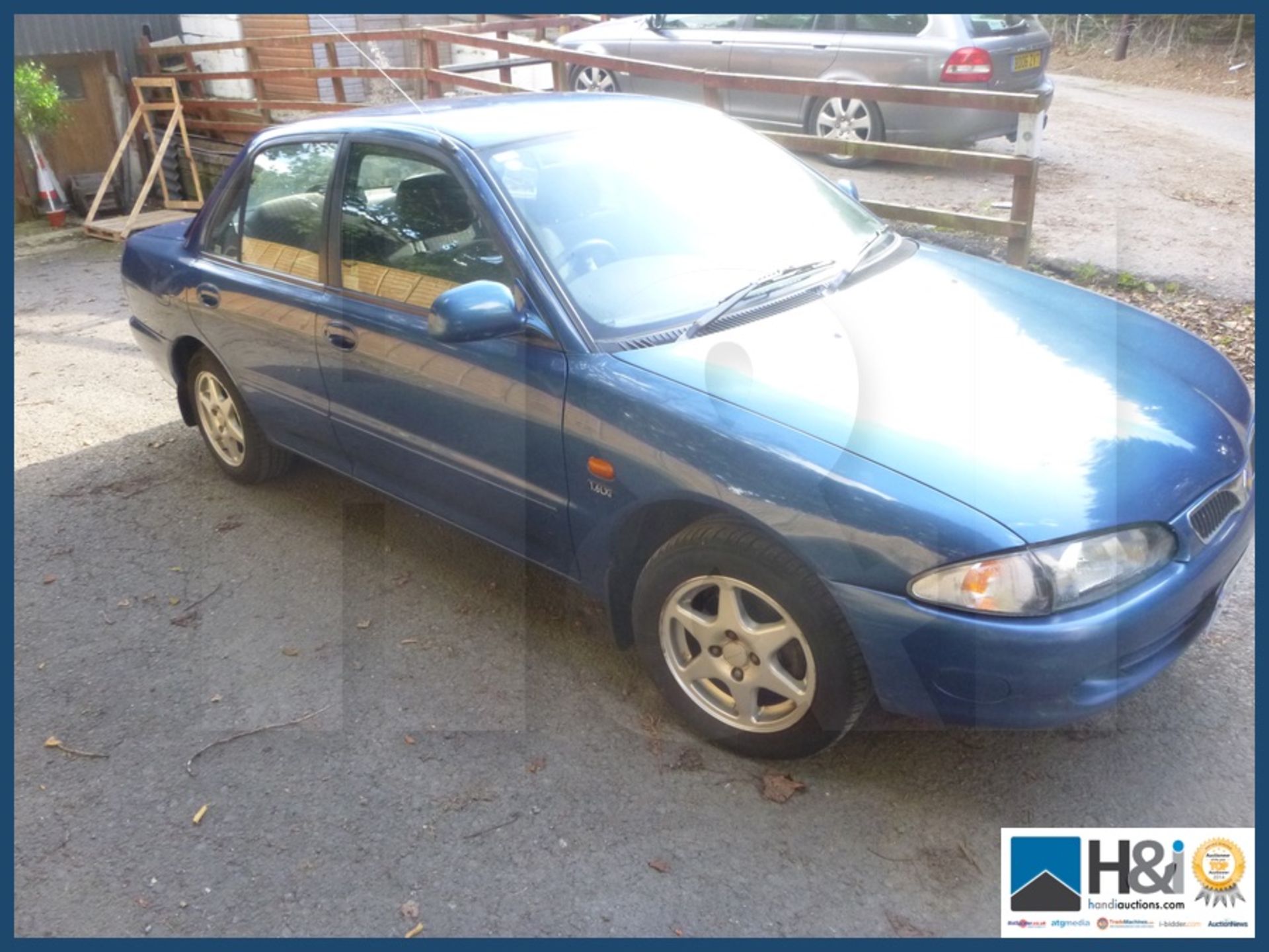 Proton Wira 1.5 petrol saloon 51 plate good runner except one brake seized on. Dog not included. - Image 2 of 14