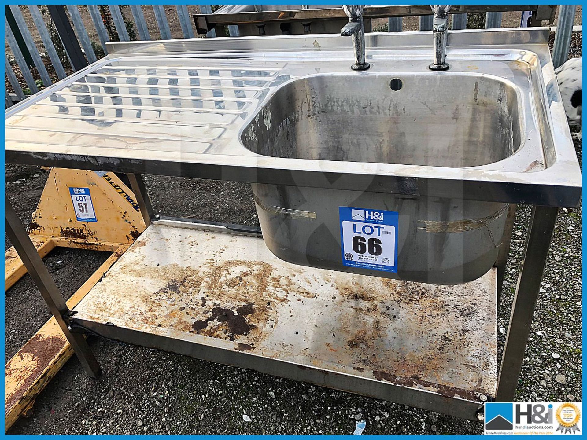 Stainless steel sink and drainer with taps