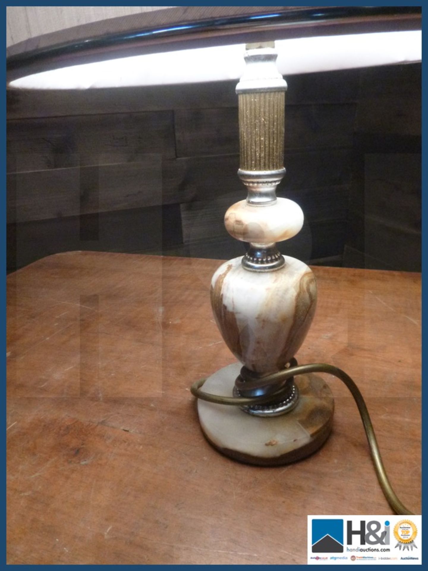 240v Table lamp comprising of cloth shade.