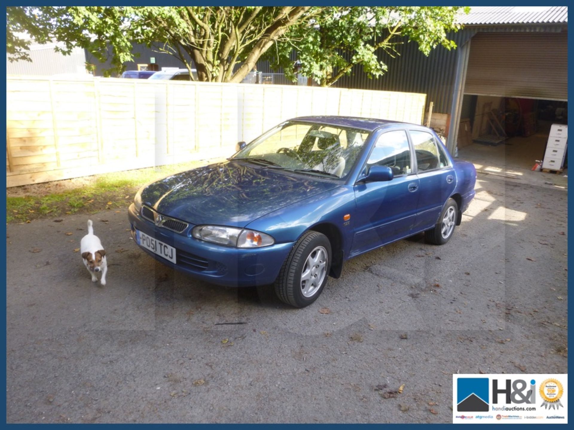 Proton Wira 1.5 petrol saloon 51 plate good runner except one brake seized on. Dog not included. - Image 14 of 14