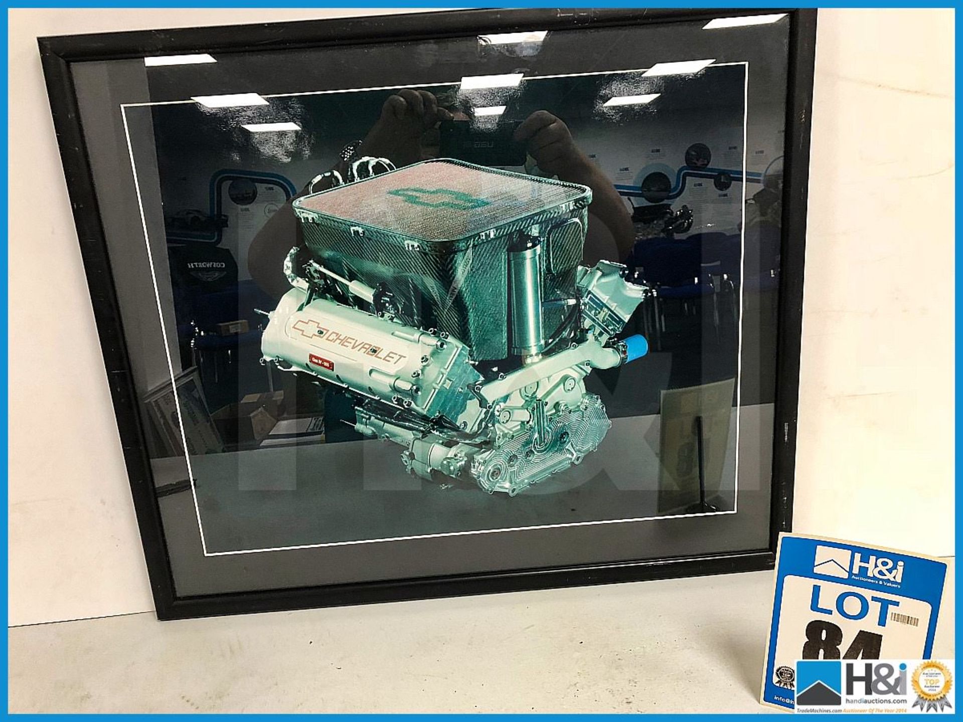Ex Cosworth works framed print of Chevrolet engine. Approx 24in x 20in. Wood frame