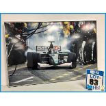 Ex Cosworth works framed print of F1 car leaving pits. Approx 30in x 20in. Crack in glass. Aluminium