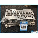 1 x Cosworth LT 2ZZ-GE ported cylinder head with Cosworth logo. Code: 20036339