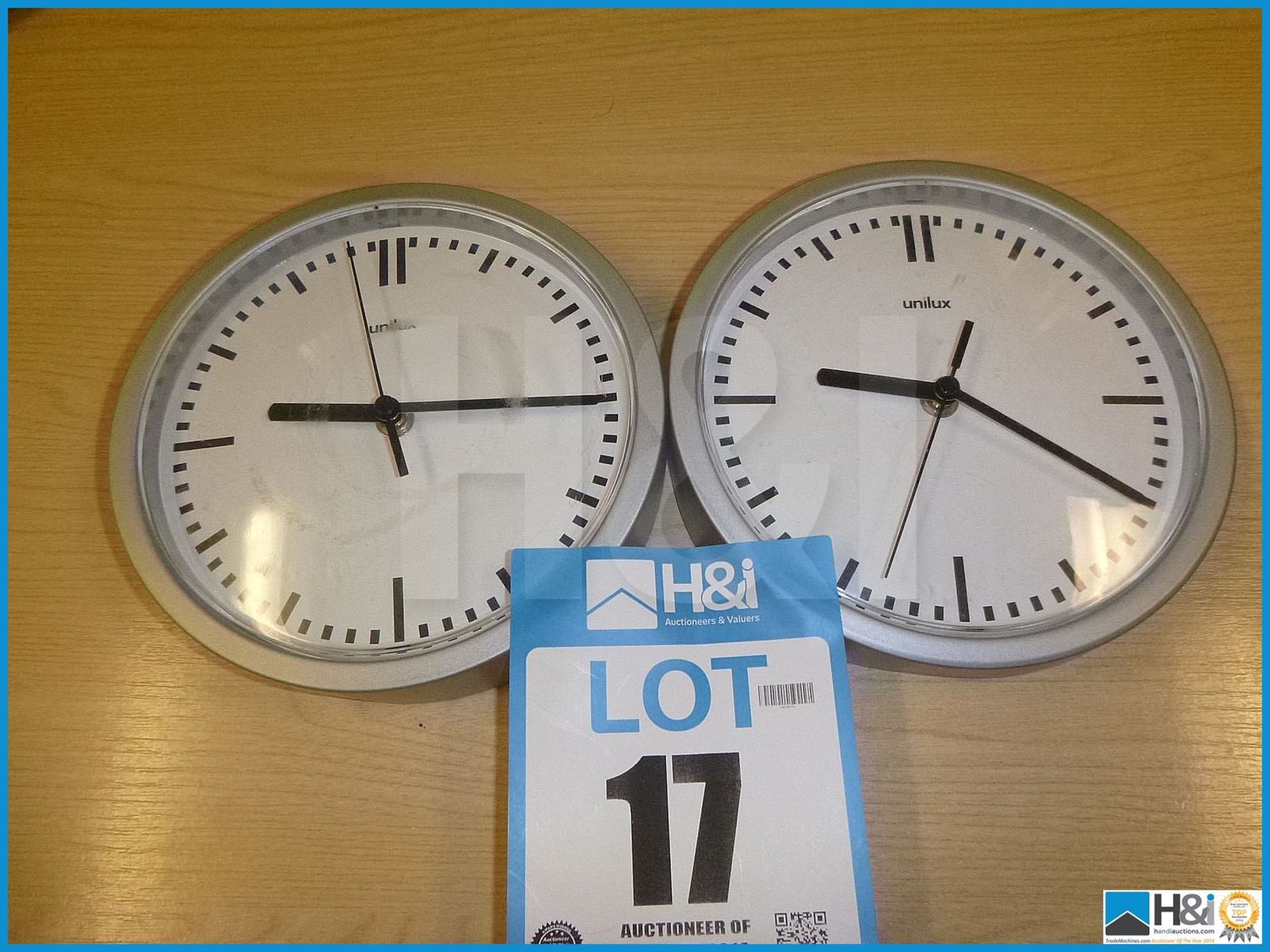 2 OFF UNILUX CLOCKS