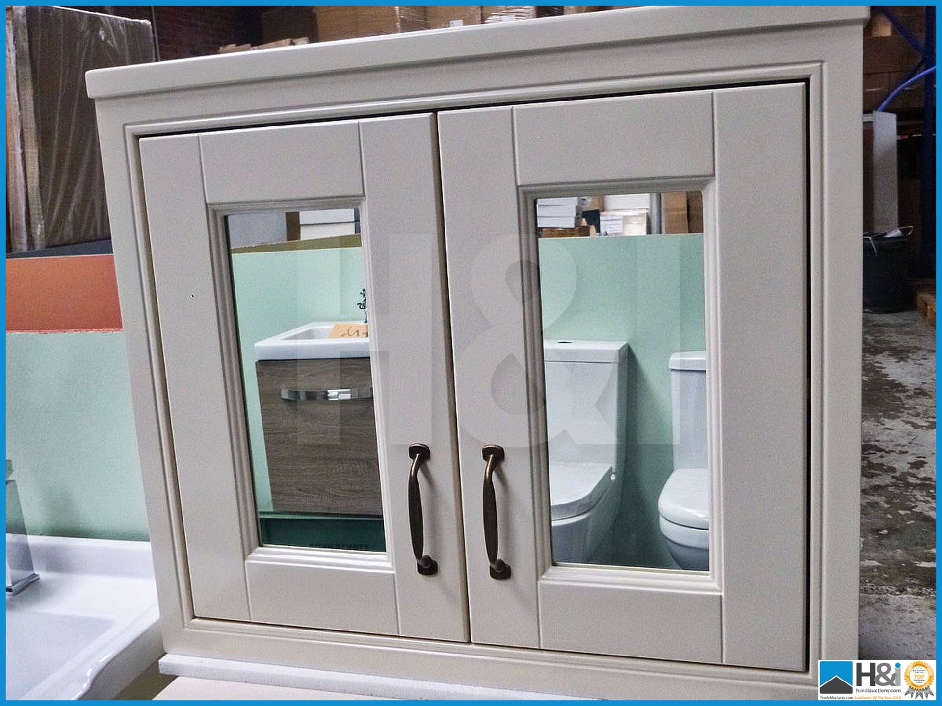 Designer two door mirror cabinet in ivory 700 mm X 600mm X 200mm. RRP £299.