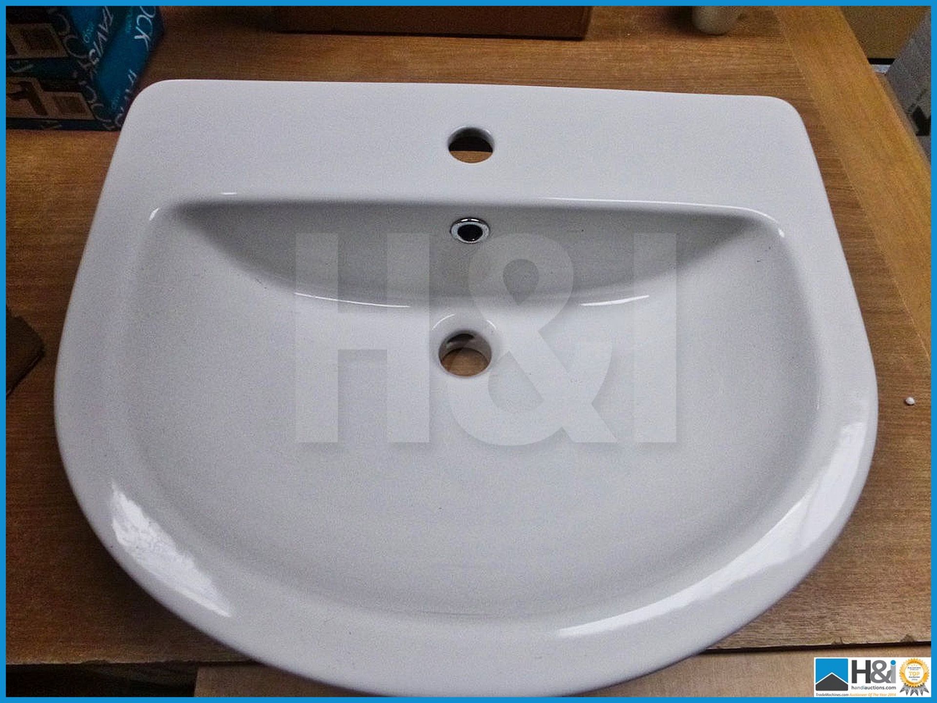 Semi recessed ceramic white basin single tap hole 560mm X 460mm X 200mm. RRP £99.