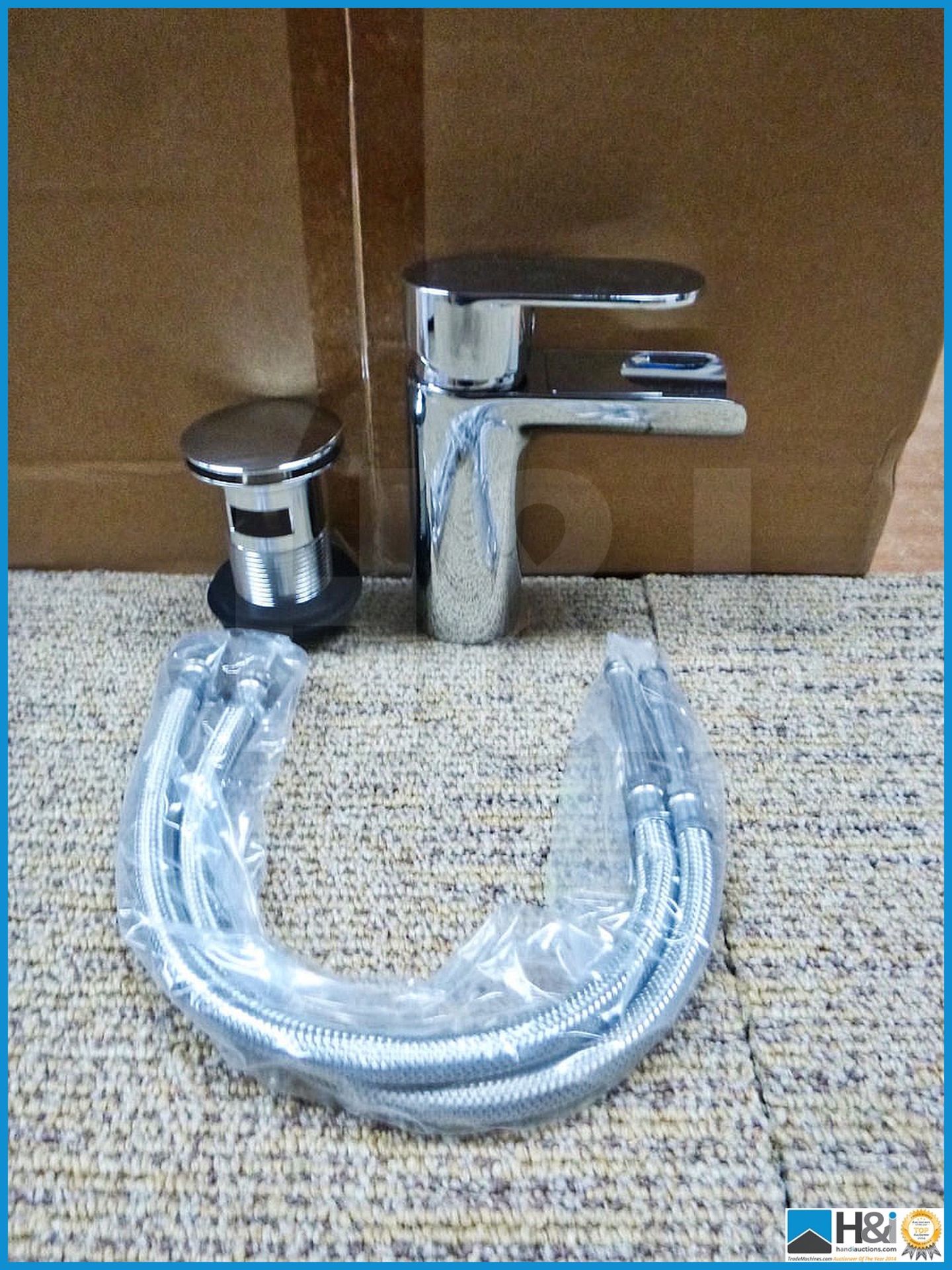 Ultra Flume chrome open spout mono basin mixer with click clack waste.