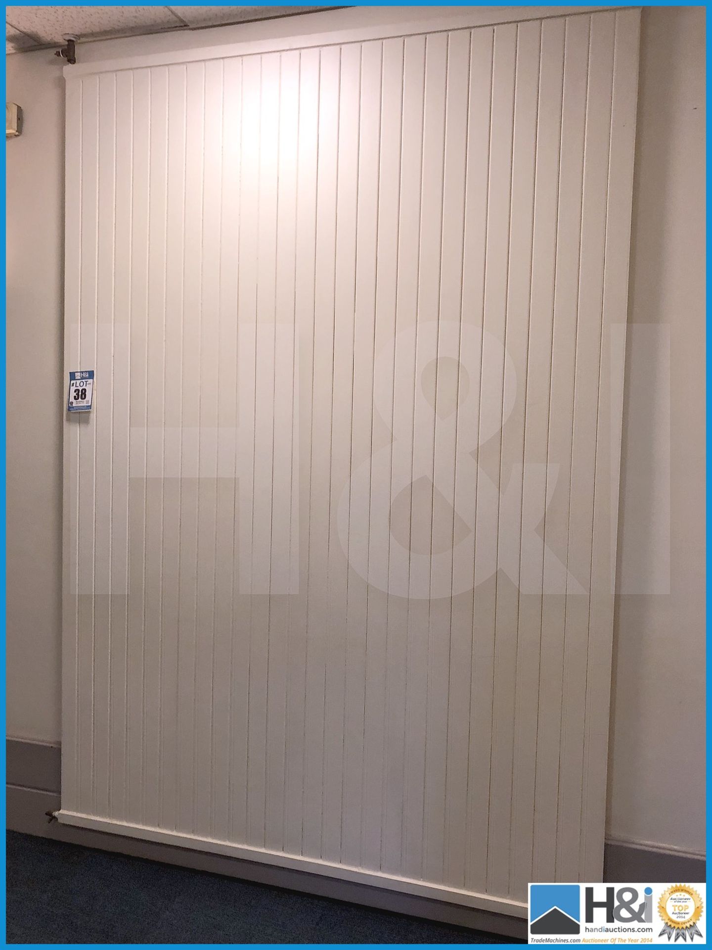 Enourmous flat panel radiator appx 6ft wide x 10ft high buyer to remove safely - PPE must be worn at