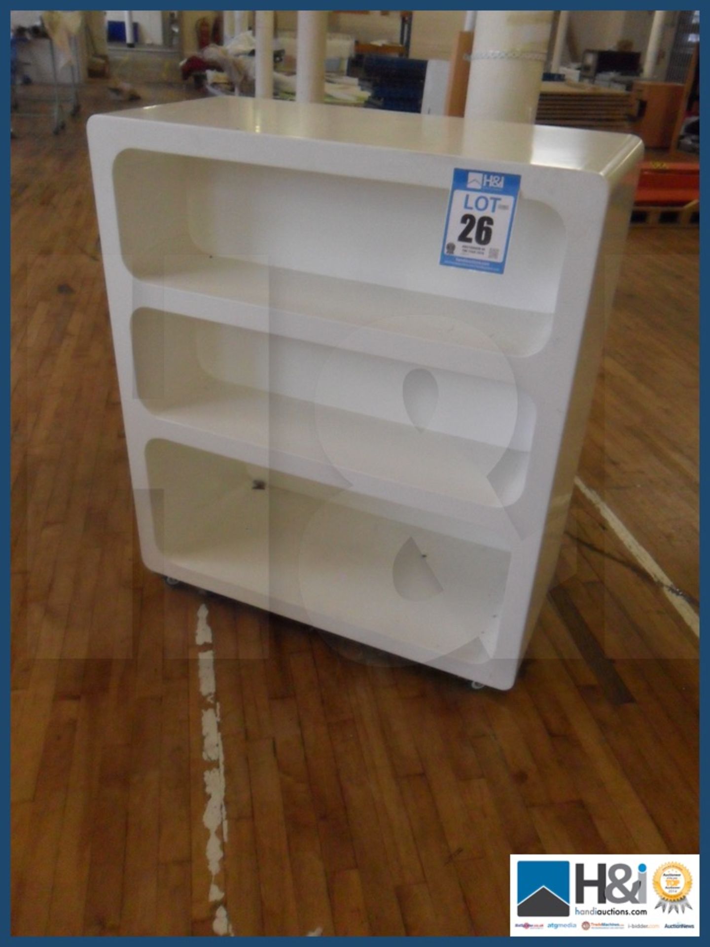 White shelving unit 37" X 17"X 42" on wheels