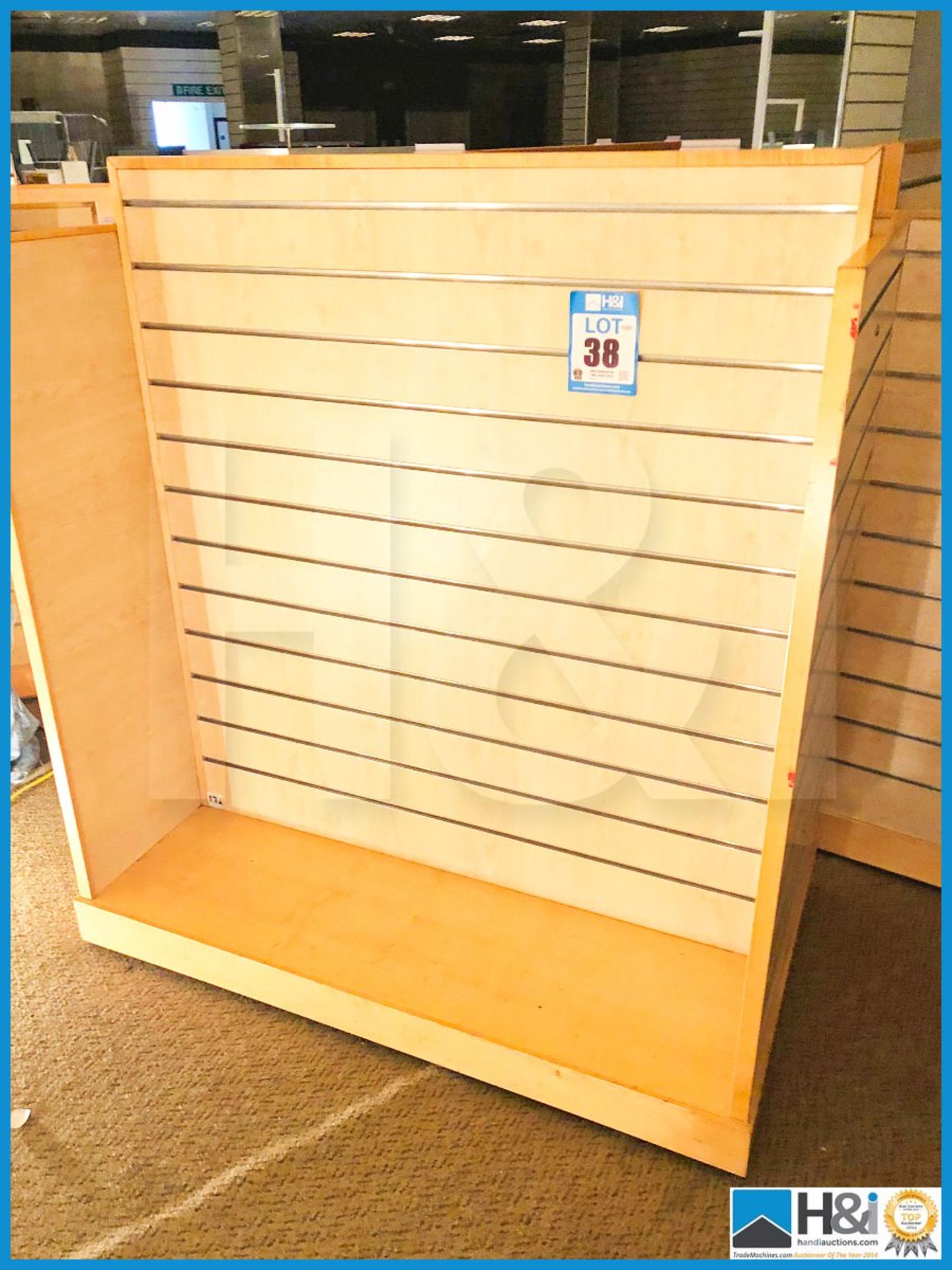 Four freestanding slat wall modular display units 1300mm X 750mm X 1400mm.