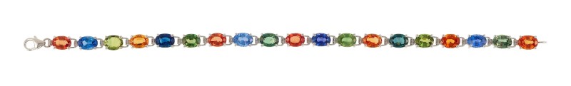 Bracelet souple or gris 750 serti de saphirs de couleur taille ovale (total env. 19 ct) long. 18.5