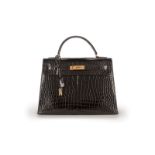 Hermès sac Kelly 32 sellier en crocodile d'estuaire noir (porosus) année 1981 bouclerie dorée