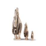 Suite de 2 okimono et 1 netsuke représentant le sage taoïste IwaGenki sur un cheval Japon ou Chine