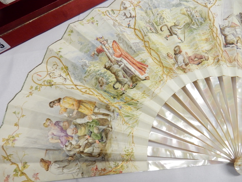 A French hand painted fan by J Duveilory with mother of pearl sticks and guards, on in a red - Image 2 of 4