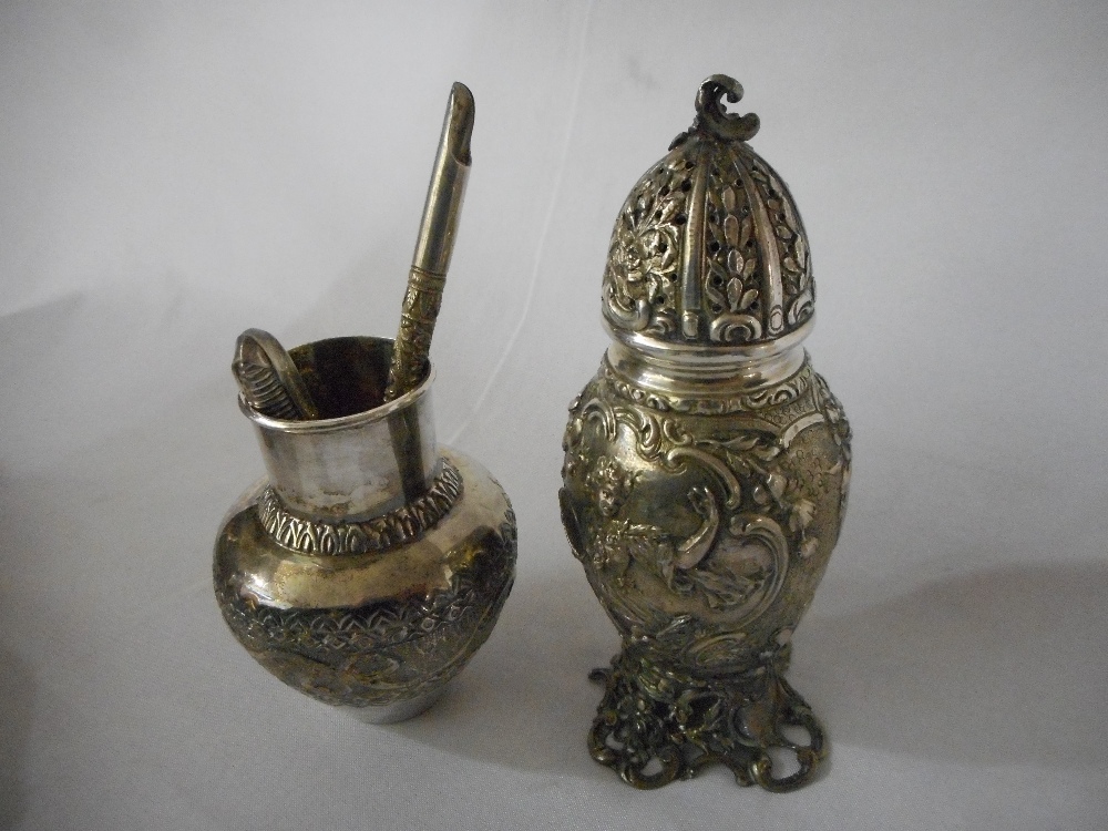 A Victorian silver sugar castor with repousse decoration of figures and leaf scrolls, on pierced - Image 2 of 2