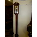 A reproduction Georgian design stick barometer by Comitti and Son of London, in a mahogany and