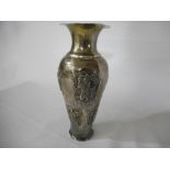 A Chinese silver vase of baluster form decorated in reserves with figures - 8 1/4in. high