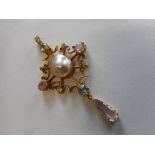 A Victorian gold pendant set mabe pearl with pink kunzite, blue topaz and diamonds, diamonds to