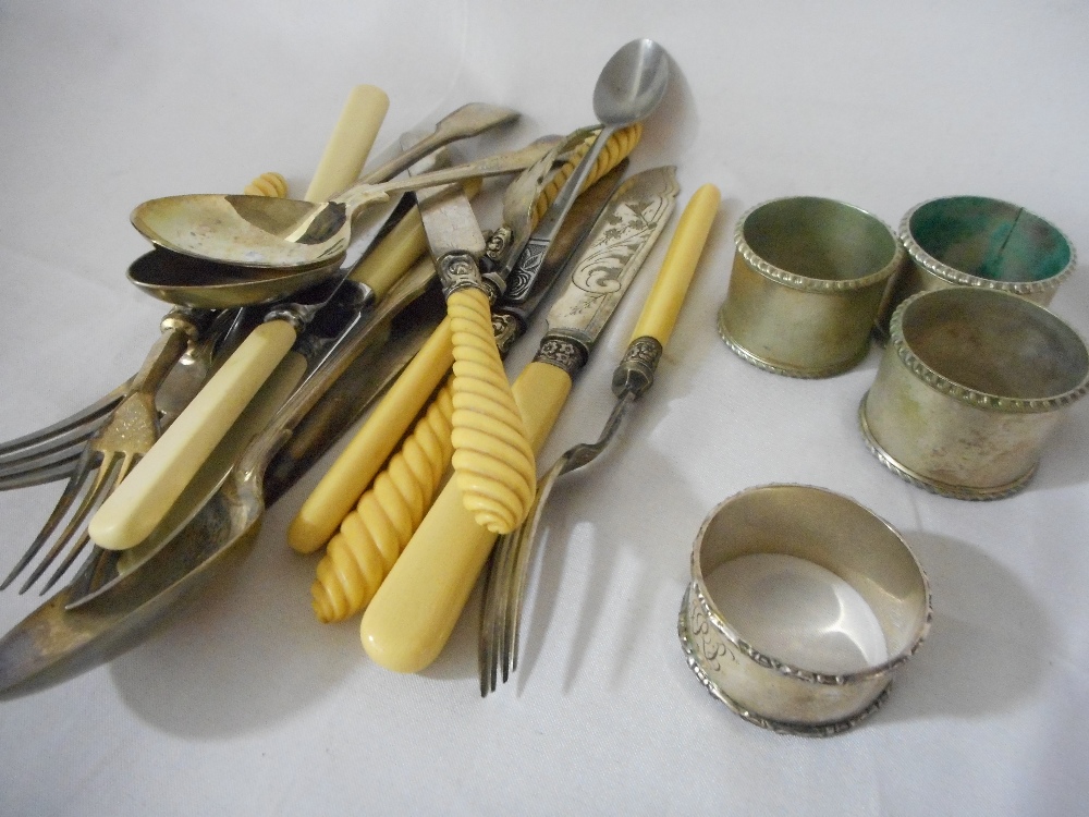 A silver napkin ring and a small quantity of silver plated flatware