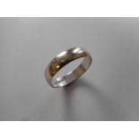 A 9ct. gold wedding band