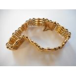 A 15ct. gold gatelink bracelet