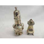 A silver salt pot on four paw feet - Chester 1933 and a silver sugar castor - Sheffield 1930 both by