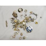 A quantity of silver, gold and other earrings, pendants, brooches, childs silver bangle etc..