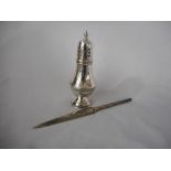 A silver sugar castor of baluster form and a silver letter opener with twist handle