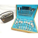 A set of dominoes, a selection of chrome flatware, a canteen of chrome flatware, a Roberts radio