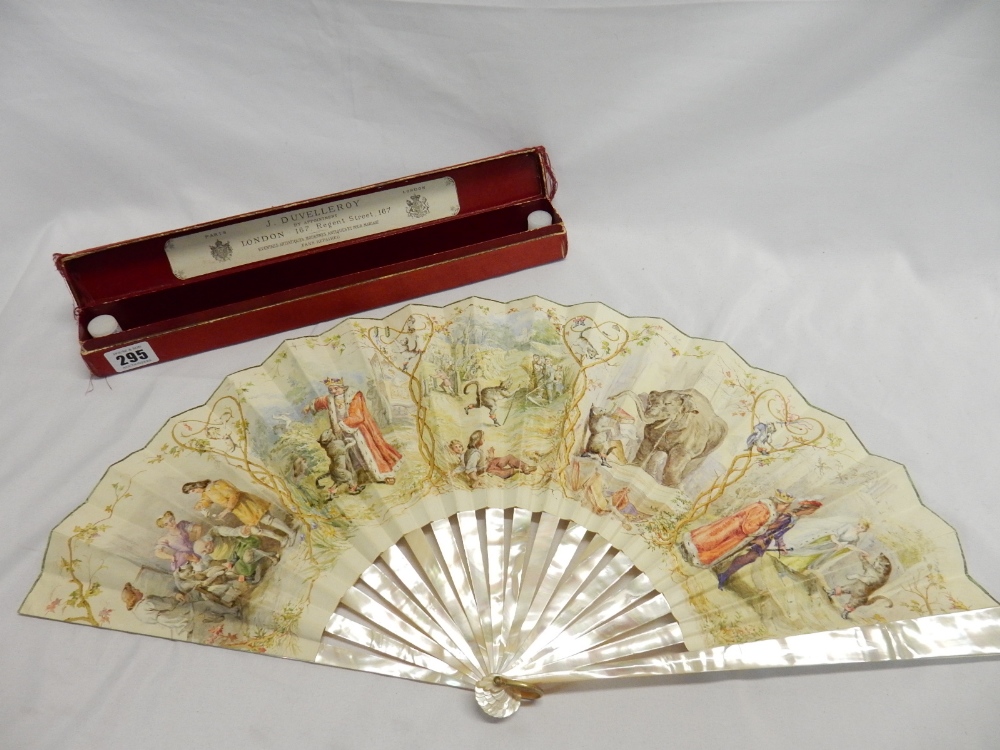 A French hand painted fan by J Duveilory with mother of pearl sticks and guards, on in a red