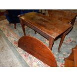 A Georgian mahogany table fitted two rounded drop flaps, on cabriole legs - 42in. wide