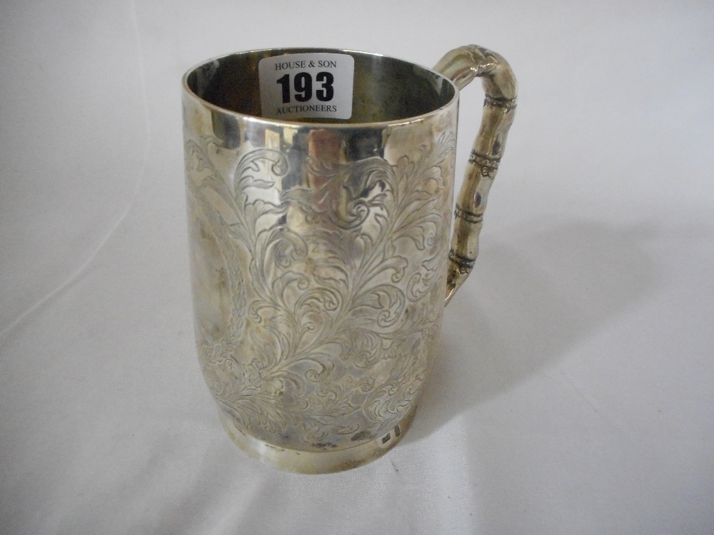 A Chinese silver tankard with bamboo style handle and engraved leaf decoration - 4 1/2in. high - Image 2 of 3