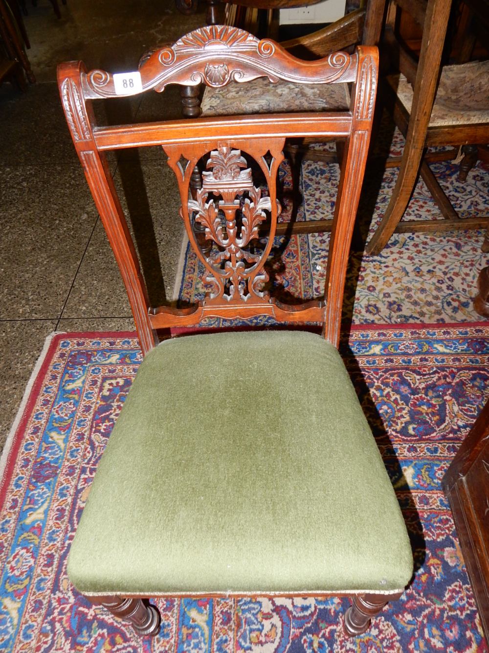 A pair of Edwardian mahogany framed dining chairs with pierced centre splats, stuff over seats, on - Image 2 of 2
