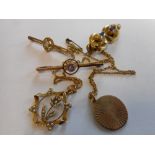 A 9ct. gold pendant of pierced design set seed pearls to flower design, a pair of Victorian earrings
