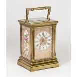 A carriage clock with pink and gold porcelain dial and side panels, French striking and repeating