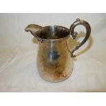 A silver plated jug with leaf clad spout, engraved to the centre Hastings Railway 1844 - 5 1/4in.